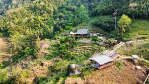 an aerial view of a house on a hill at Mama Pham Homestay in Tả Van