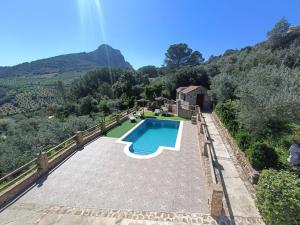 an external view of a swimming pool in a villa at Villa Jael in El Gastor