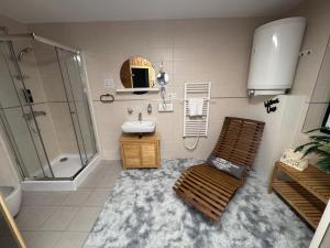 a bathroom with a sink and a shower at Sonjas Auszeit in Rust +19 photos