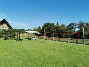 a field with a net and a goal at Agroturystyka Ranczo Turzyniec w pobliżu Zwierzyńca in Turzyniec +27 photos