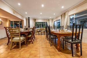 a dining room with a table and chairs at Ramabanta Trading Post in Setleketseng