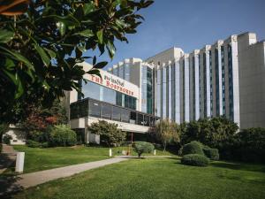 a large building with a sign on the front of it at Swissotel The Bosphorus Istanbul in Istanbul