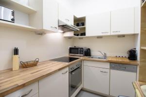 Küche/Küchenzeile in der Unterkunft Vienna Midtown Apartment