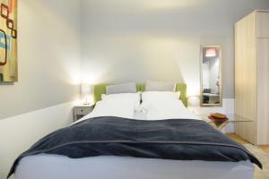 Ein Bett oder Betten in einem Zimmer der Unterkunft Vienna Midtown Apartment