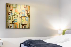 Ein Bett oder Betten in einem Zimmer der Unterkunft Vienna Midtown Apartment