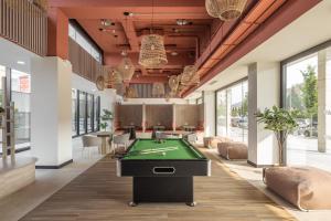 a billiard room with a pool table at Amro Pamplona - Albergue Juvenil in Pamplona