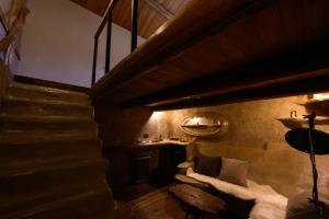 a living room with a couch and a table at cofunia - Five Elements Retreat on the Yamanobe Trail in Tenri +56 photos