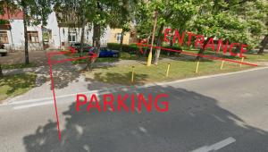 a rendering of a street with the words parking at Danubia Apartment Gabčíkovo in Gabčíkovo