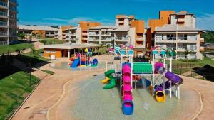 a water park with a playground with slides and water slidesktop at Ilhas do Lago in Caldas Novas