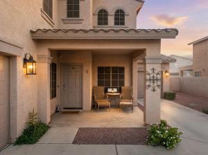 a patio of a house with a door and a table at Pool Grill Games Chill - Surprise Awaits in Surprise