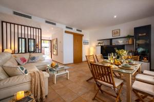 a living room with a couch and a table at Starfish Mojácar in Mojácar
