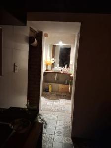 a bathroom with a sink and a mirror at Anam Cara in Isla del Rincón