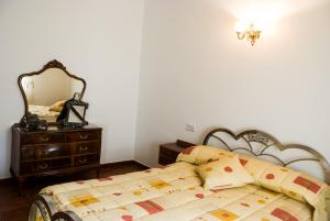 Postel nebo postele na pokoji v ubytování Casa Felix