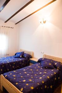 Postel nebo postele na pokoji v ubytování Casa Felix