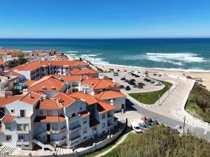 arial view of a beach with buildings and the ocean at BC Beach House - Santa Cruz in Santa Cruz