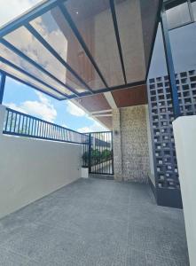 an empty room with a view of a balcony at Villa Cassandra Atasha Private Resort - Celestine in Cuayan