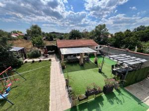 an overhead view of a backyard with a picnic table at House Varna-4 in Krapets