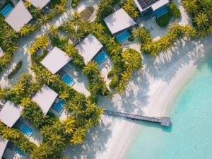 an aerial view of a resort on a beach at SO/ Maldives in South Male Atoll