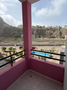 a balcony with a view of a pool at Apartamento Rua de Horta in Ribeira Grande