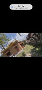 a screenshot of a picture of a house at Sn homes in Dehradun