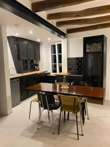 Eldhús eða eldhúskrókur á Appartement duplex