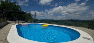 a large swimming pool with a frisbee in it at Relax House Lara in Krapinske Toplice in Krapinske Toplice