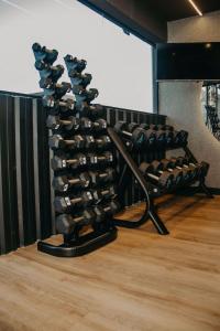 a wine rack filled with lots of wine bottles at Blue Tree Towers Jaguariúna in Jaguariúna +50 photos