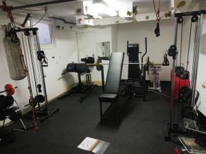 a gym with a lot of equipment in a room at Charming Mobile Home Retreat in Ebbs, Austria - Tranquil Escape in Ebbs