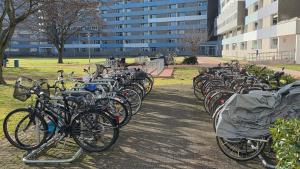 a row of bikes parked in a park at FEWO-Luik H-1-6 in Heiligenhafen