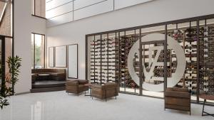 ein Weinprobenraum mit einer Wand aus Weinflaschen in der Unterkunft Vintedge Residences in Lyndhurst