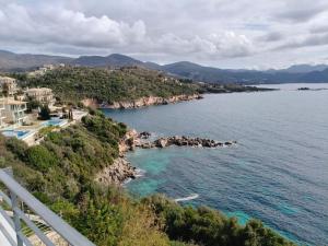 a view of a body of water with houses at Villa Oikos in Syvota