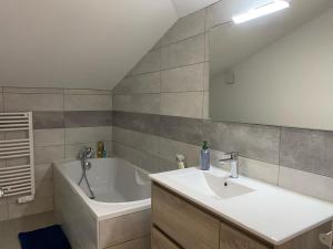 Baðherbergi á Appartement duplex