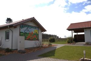 a mural on the side of a building at Weserberglandalm Haus 3 in Ottenstein