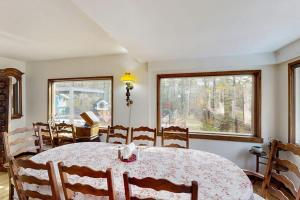 a dining room with a table and chairs at Hidden Haven in Bath +57 photos