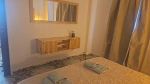 Llit o llits en una habitació de Refugio del Jagüel Dto Familiar Equipado Centro Munro Cerca Tecnópolis y River