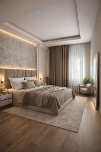 a bedroom with a large bed and a large window at Paris and Eneas Studios in Vlorë