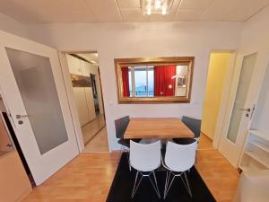 a dining room with a table and chairs at Appartement Peter in Freyung im Bayerischen Wald in Freyung