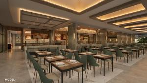 a restaurant with wooden tables and green chairs at Riu Palace Peninsula - All Inclusive in Cancún