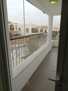 a balcony with a view of a pool at Villa Dreamy Pool Garden in Eilat