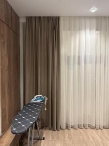 a room with a treadmill in front of a window at Mountain sight Villa in Sheki
