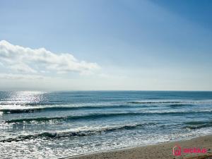 a view of the ocean from the beach at Poble Mar 8 in Oropesa del Mar