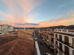 a view of a city with cars driving down a street at Art Deco 882 in Cuenca