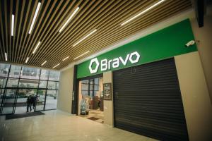 a store with a garage door in a building at Baku Sabah Apart in Baku
