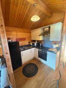an overhead view of a kitchen in a cabin at The Firkin Lodge in Whaplode