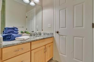 a bathroom with a sink and a mirror at The Hill Dog Friendly Panoramic Ocean Views in York +56 photos
