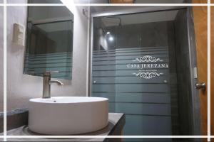 a bathroom with a sink and a mirror at Casa Jerezana Hotel Boutique in Jerez de García Salinas +6 photos