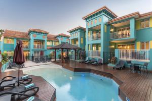 an image of a swimming pool at a house at Le Cher Du Monde Adults Only in Port Douglas