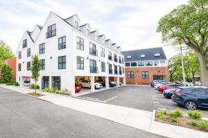 an apartment building with a parking lot at Modern Yale Loft Best Location Parking in New Haven