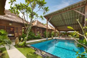 an image of a villa with a swimming pool at Gecko Villa & Bungalows in Nusa Lembongan