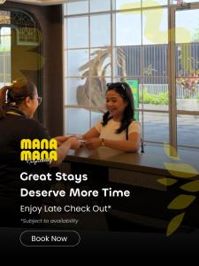 two women sitting at a table talking at Stallionz by Mana Mana in Ipoh